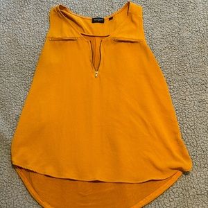 Light brown no sleeve shirts size xl